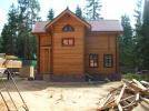 строительство деревянного дома из оцилиндрованного бруса