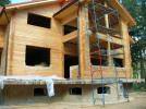 строительство деревянного дома из оцилиндрованного бруса
